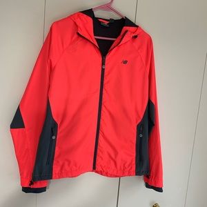 New Balance L wind breaker bright orange hood